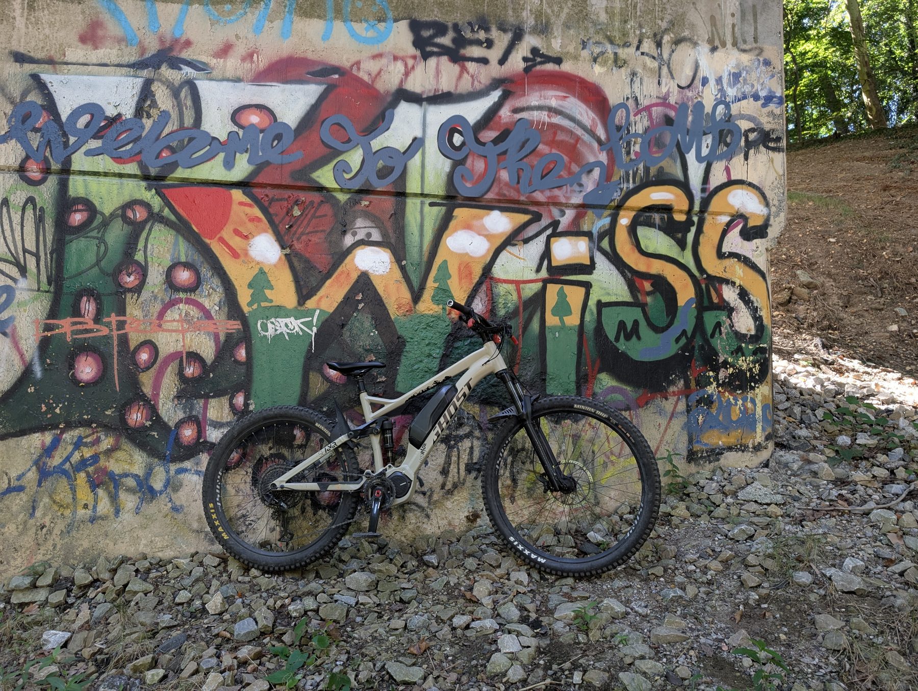 Mountain bike by a Swiss mural